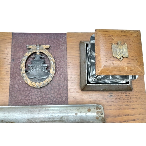250 - Kriegsmarine Memorial Desk Set. The High Seas Badge indicates he served on Battleships and Cruisers.... 