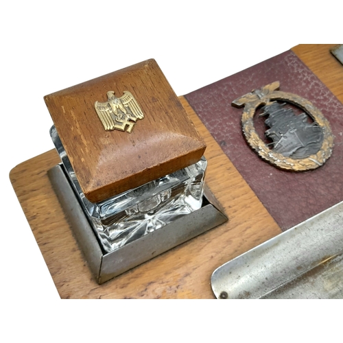 250 - Kriegsmarine Memorial Desk Set. The High Seas Badge indicates he served on Battleships and Cruisers.... 