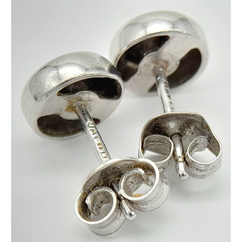 548 - A PAIR OF 18K WHITE GOLD RUB-OVER SET DIAMOND STUD EARRINGS. 0.30CTW. 2.1G. A/S 1312.