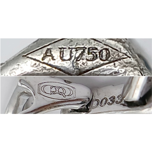 555 - AN 18K WHITE GOLD DIAMOND AND SAPPHIRE DROP PENDANT. 0.33CTW DIAMONDS AND 0.60CT SAPPHIRE. 2.5G.
22M... 