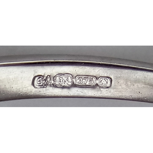 559 - A 9K WHITE GOLD DIAMOND SET HEART RING. TOTAL WEIGHT 2G. SIZE S. SC 9012