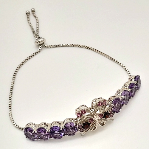 565 - A Pretty Sterling Silver Amethyst, Pink Tourmaline and Garnet Bracelet. One Size Pull Through Adjust... 