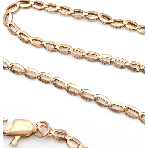 570 - A 9K Yellow Gold Diamond Head Form Necklace. 42cm. 6.9g. Note: Clasp in need of a new spring.