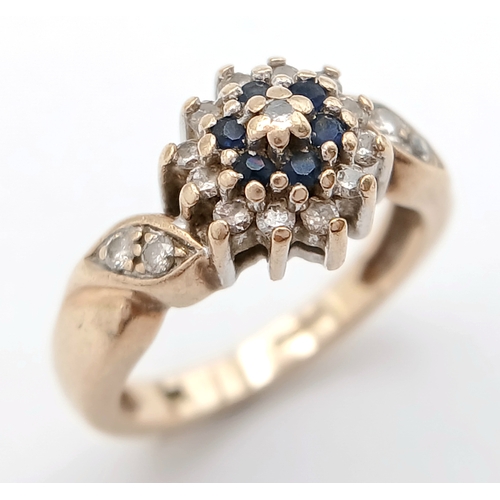 587 - A 9K YELLOW GOLD DIAMOND AND SAPPHIRE RING. TOTAL WEIGHT 2.8G, SIZE F. SC 9064