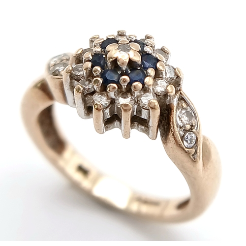 587 - A 9K YELLOW GOLD DIAMOND AND SAPPHIRE RING. TOTAL WEIGHT 2.8G, SIZE F. SC 9064