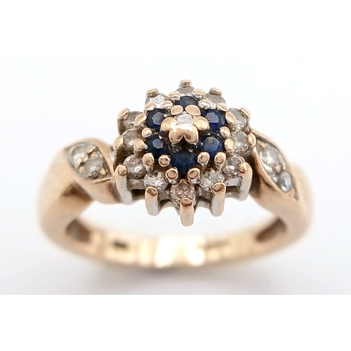 587 - A 9K YELLOW GOLD DIAMOND AND SAPPHIRE RING. TOTAL WEIGHT 2.8G, SIZE F. SC 9064