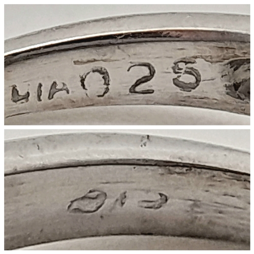 593 - A 9K WHITE GOLD DIAMOND CLUSTER RING. DIAMOND WEIGHT 0.25CT. TOTAL WEIGHT 2.2G. SIZE L 1/2. SC 9083