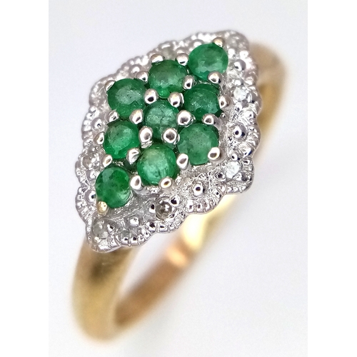 600 - A 9K YELLOW GOLD DIAMOND AND EMERALD RING. TOTAL WEIGHT 2.7G. SIZE P. SC 9084