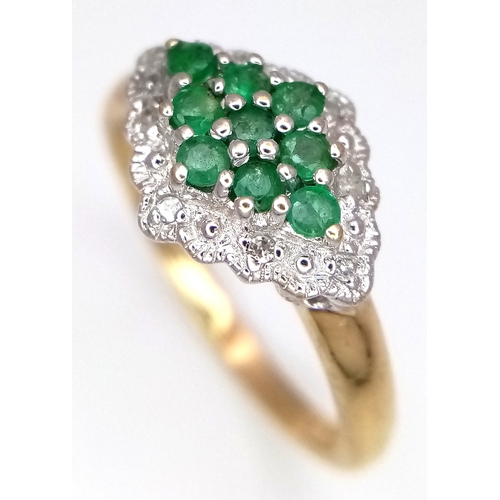 600 - A 9K YELLOW GOLD DIAMOND AND EMERALD RING. TOTAL WEIGHT 2.7G. SIZE P. SC 9084