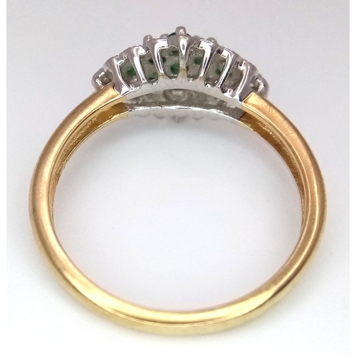 600 - A 9K YELLOW GOLD DIAMOND AND EMERALD RING. TOTAL WEIGHT 2.7G. SIZE P. SC 9084