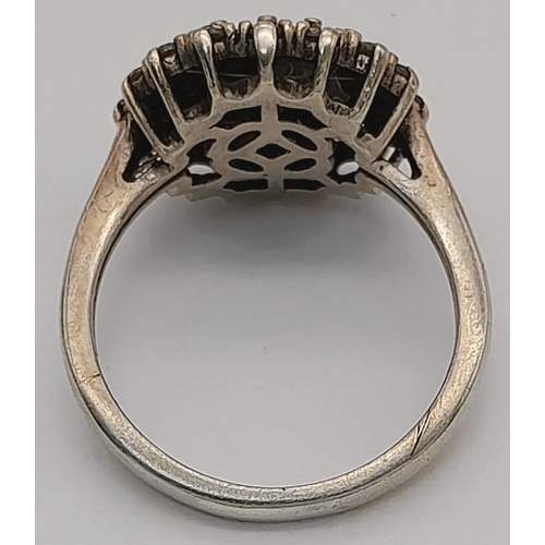 613 - A Vintage Sterling Silver Art Deco Design Diamond Cluster Ring, Size L. The ring is set with a profu... 