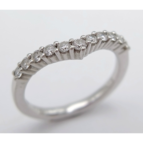 614 - A PLATINUM DIAMOND SET SHAPED BAND RING, 0.26CT DIAMOND WEIGHT. TOTAL WEIGHT 2.8G. SIZE H. 8252