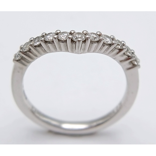 614 - A PLATINUM DIAMOND SET SHAPED BAND RING, 0.26CT DIAMOND WEIGHT. TOTAL WEIGHT 2.8G. SIZE H. 8252