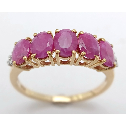 620 - A Stylish Gold on Silver Five Stone Ruby Ring, Size N. The Ring is set with Five 4mm Long Oval Cut R... 