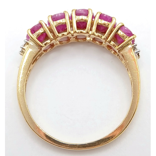 620 - A Stylish Gold on Silver Five Stone Ruby Ring, Size N. The Ring is set with Five 4mm Long Oval Cut R... 