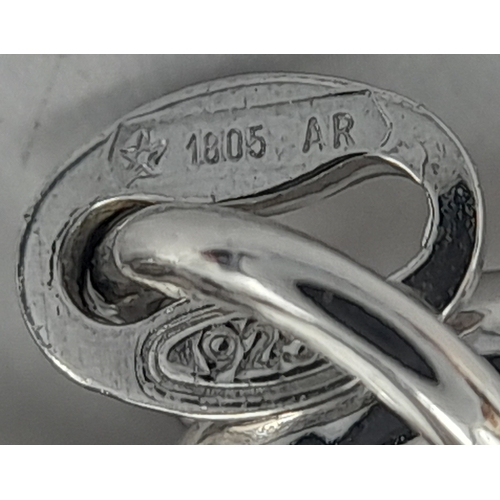 642 - A STERLING SILVER HEAVY CHARM BRACELET. 70.6G. 18CM.
JSIL-9011.