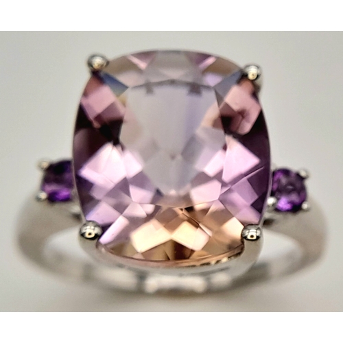 725 - A Pretty Sterling Silver Ametrine and Amethyst Set Trilogy Ring, Size S. The ring is set with a 1.5c... 