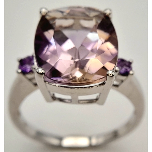 725 - A Pretty Sterling Silver Ametrine and Amethyst Set Trilogy Ring, Size S. The ring is set with a 1.5c... 
