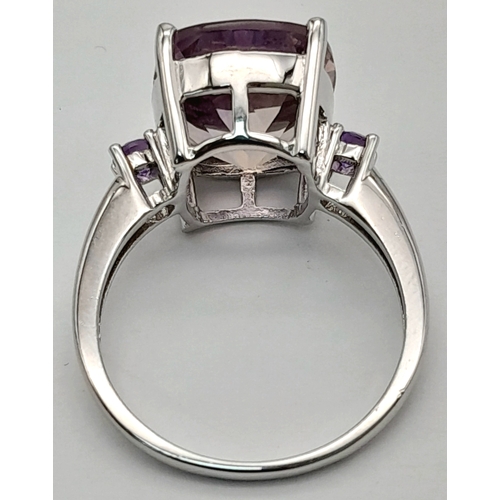 725 - A Pretty Sterling Silver Ametrine and Amethyst Set Trilogy Ring, Size S. The ring is set with a 1.5c... 