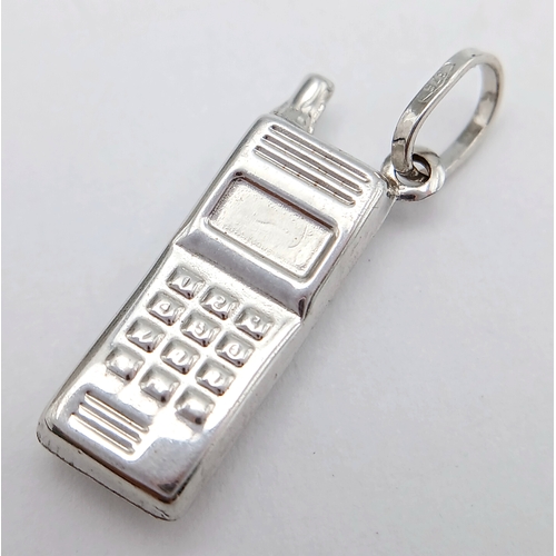 726 - A 9K WHITE GOLD VINTAGE MOBILE PHONE CHARM / PENDANT. TOTAL WEIGHT 0.8G. SC 9015