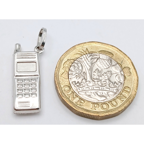 726 - A 9K WHITE GOLD VINTAGE MOBILE PHONE CHARM / PENDANT. TOTAL WEIGHT 0.8G. SC 9015