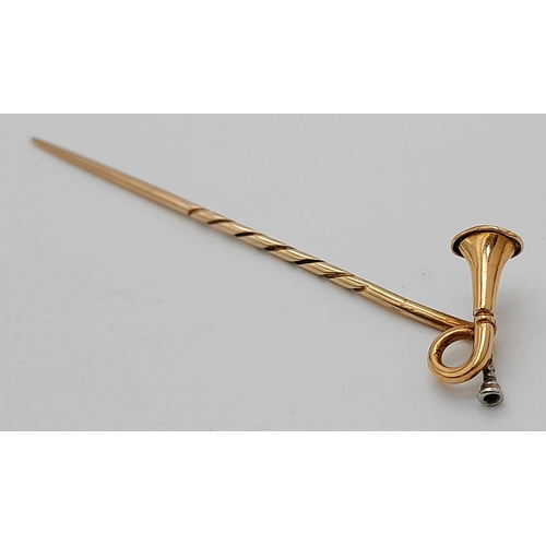 728 - Antique Yellow Metal Stick Pin with GOLD BUGLE. 1.45 Grams. 6.0 cm.