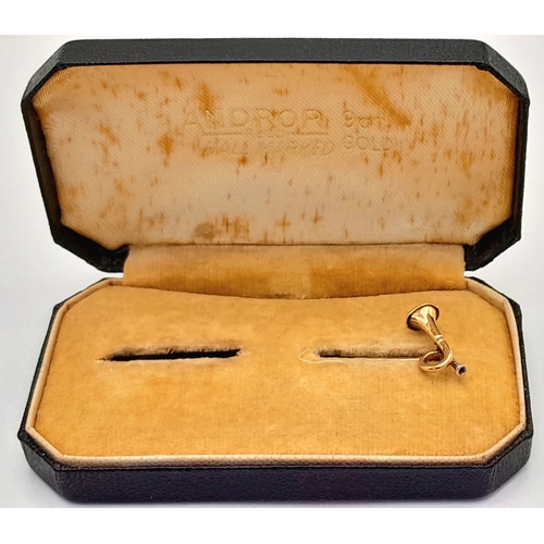 728 - Antique Yellow Metal Stick Pin with GOLD BUGLE. 1.45 Grams. 6.0 cm.
