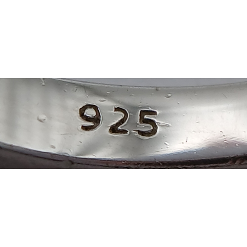 739 - A Sterling Silver Pear Cut Ruby Set Trilogy Ring, Size Q, The Ring is set with three 8mm Length Rubi... 