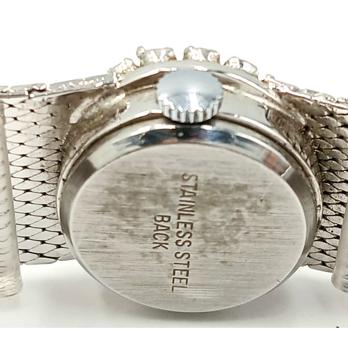 742 - Ladies vintage ‘CORRONADE’  BRACELET WRISTWATCH. Finished in Silver Tone.  Having Midnight Blue oval... 