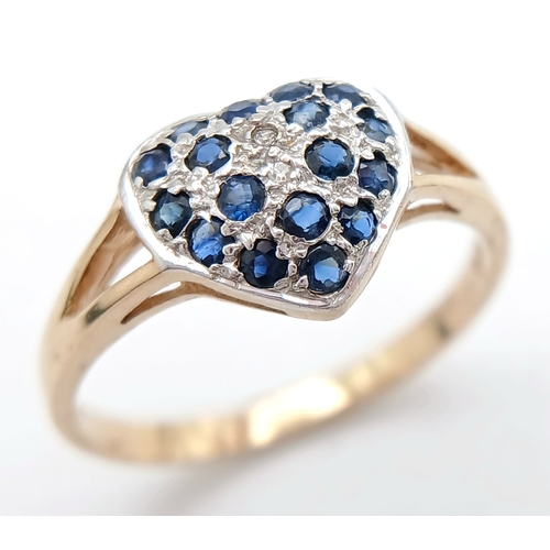747 - A 9K YELLOW GOLD DIAMOND AND SAPPHIRE SET HEART CLUSTER RING. TOTAL WEIGHT 1.6G. SIZE N. SC 9065