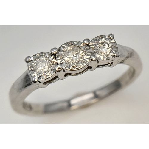 754 - A FANCY 9K WHITE GOLD DIAMOND 3 STONE RING. TOTAL WEIGHT 1.9G, SIZE J. SC 9066