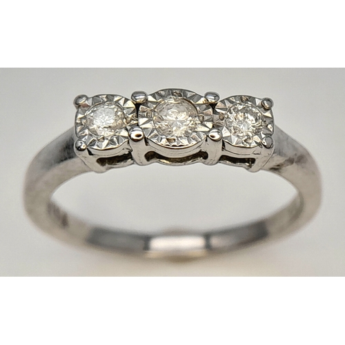 754 - A FANCY 9K WHITE GOLD DIAMOND 3 STONE RING. TOTAL WEIGHT 1.9G, SIZE J. SC 9066