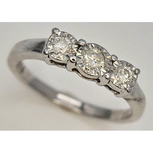 754 - A FANCY 9K WHITE GOLD DIAMOND 3 STONE RING. TOTAL WEIGHT 1.9G, SIZE J. SC 9066