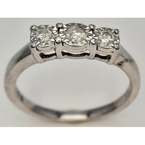 754 - A FANCY 9K WHITE GOLD DIAMOND 3 STONE RING. TOTAL WEIGHT 1.9G, SIZE J. SC 9066