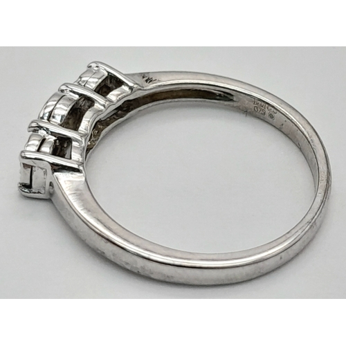 754 - A FANCY 9K WHITE GOLD DIAMOND 3 STONE RING. TOTAL WEIGHT 1.9G, SIZE J. SC 9066