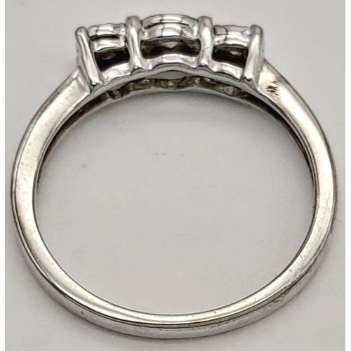 754 - A FANCY 9K WHITE GOLD DIAMOND 3 STONE RING. TOTAL WEIGHT 1.9G, SIZE J. SC 9066