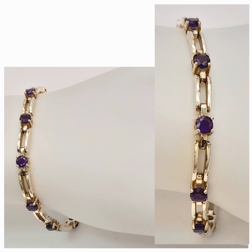 767 - A Very Elegant Sterling Silver Amethyst Set Tennis Bracelet-19cm Length. The Bracelet is set with El... 