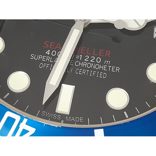 840 - A ROLEX DEALERS CONCESSIONARY WALL CLOCK POWERED BY ONE AA BATTERY. 34cm DIAMETER.