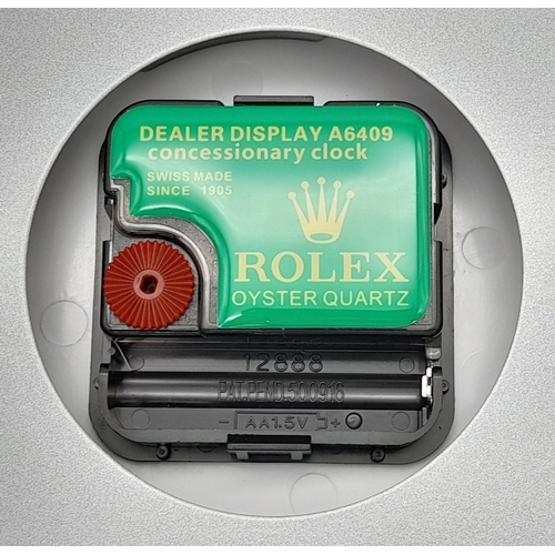 840 - A ROLEX DEALERS CONCESSIONARY WALL CLOCK POWERED BY ONE AA BATTERY. 34cm DIAMETER.