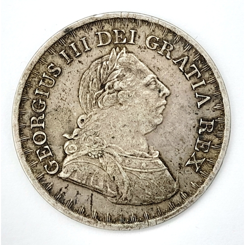 876 - A George III Silver Three Shillings Bank Token.