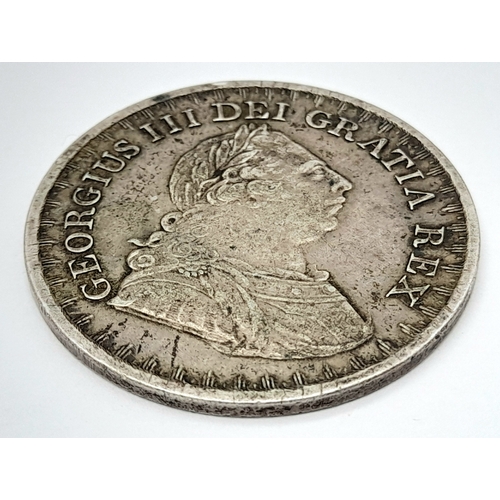 876 - A George III Silver Three Shillings Bank Token.