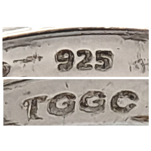 887 - A Very Impressive Sterling Silver Fancy Effect Round Cut Amethyst Ring, Size P1/2. The Ring measures... 