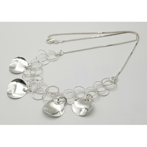 902 - A STERLING SILVER FANCY DESIGN NECKLACE. 8.9G. 40CM. JSIL-9020.