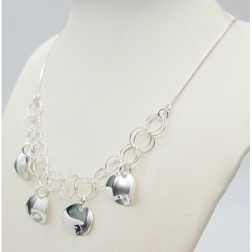 902 - A STERLING SILVER FANCY DESIGN NECKLACE. 8.9G. 40CM. JSIL-9020.