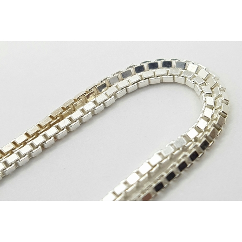 902 - A STERLING SILVER FANCY DESIGN NECKLACE. 8.9G. 40CM. JSIL-9020.