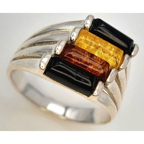 915 - A Very Unique Vintage Sterling Silver and Multi-Colour Amber Ring, Size M. The Ring is set with Rect... 