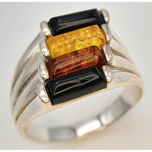915 - A Very Unique Vintage Sterling Silver and Multi-Colour Amber Ring, Size M. The Ring is set with Rect... 