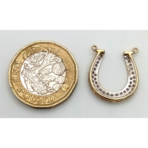 942 - A fancy 9K yellow gold Diamond horseshoe lucky charm/pendant. Total weight 1.42G.