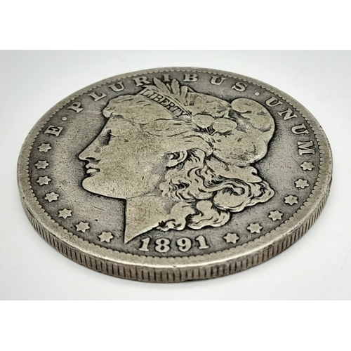 943 - An 1891 Dated Fine Condition Morgan Silver Dollar coin- New Orleans Mint-26.09 Grams. Graded on Shel... 