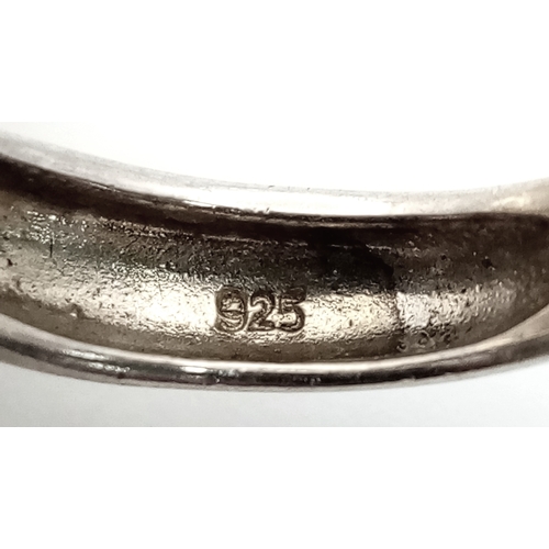 957 - A Vintage Sterling Silver Blue Chalcedony Cabochon Statement Ring, Size K. The Ring is set with a im... 